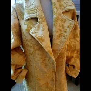 Verity brand Couture overcoat in Mustard